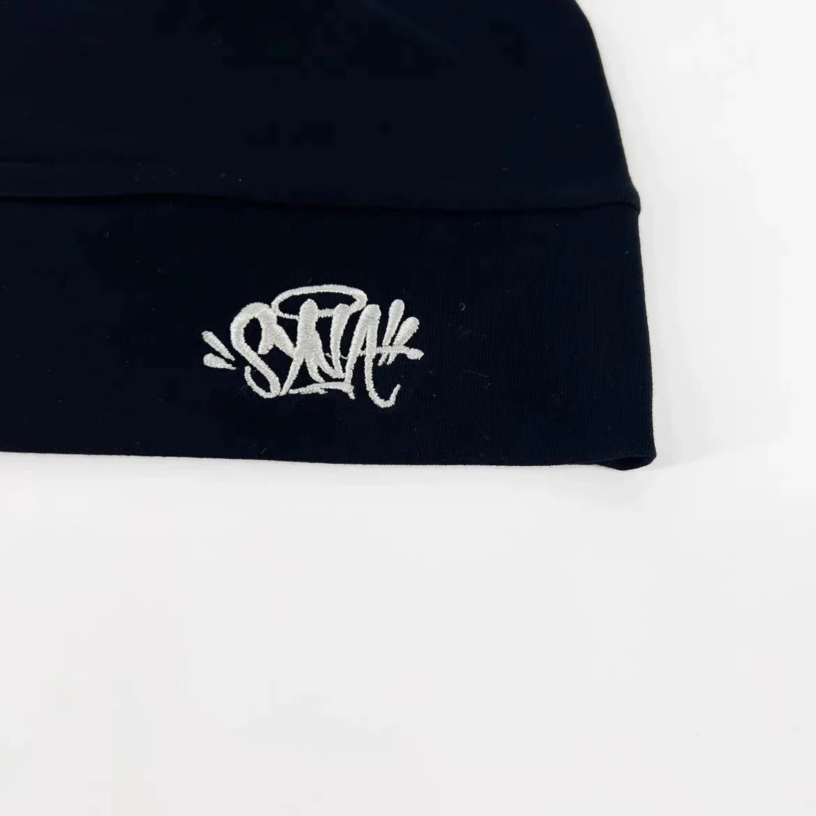 Cap Syna World The Plug