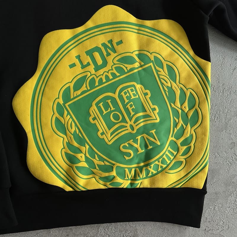 Syna World College Logo Black/Yellow My Store